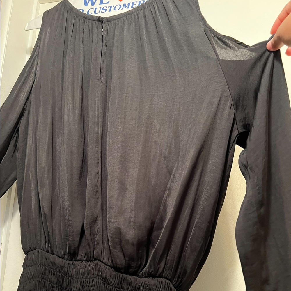 Black blouse with shoulder cutouts